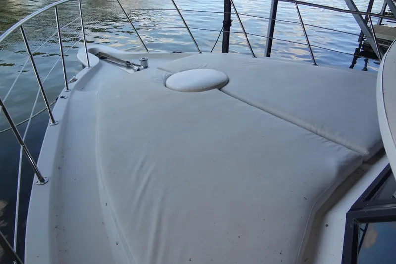 Slide: The Image of 2008 Bluewater 5200 Signature Edition boat deck with cushioned seating. - 14