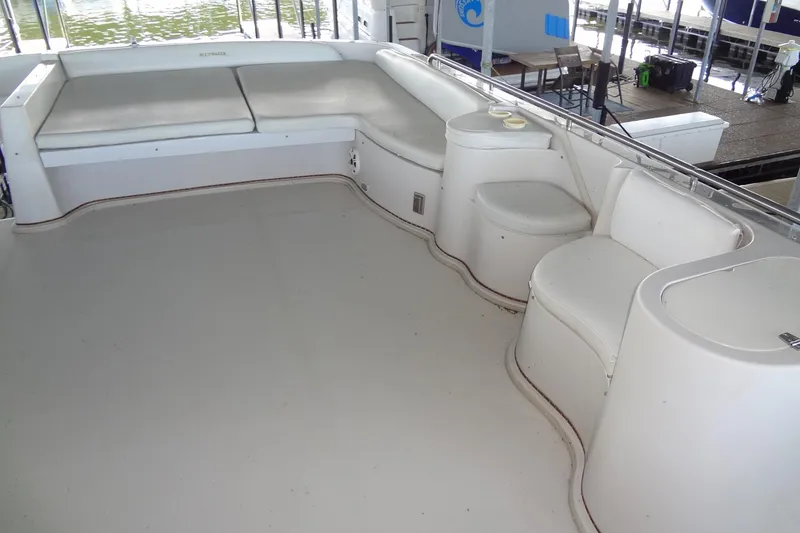 Slide: The Image of Spacious deck of 2008 Bluewater 5200 Signature Edition yacht with cushioned seating. - 20