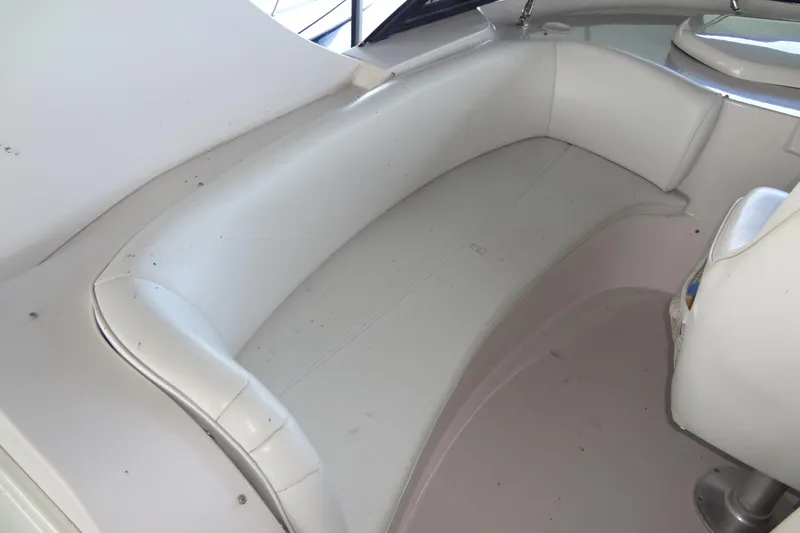 Slide: The Image of White seating area on 2008 Bluewater 5200 Signature Edition boat interior. - 24