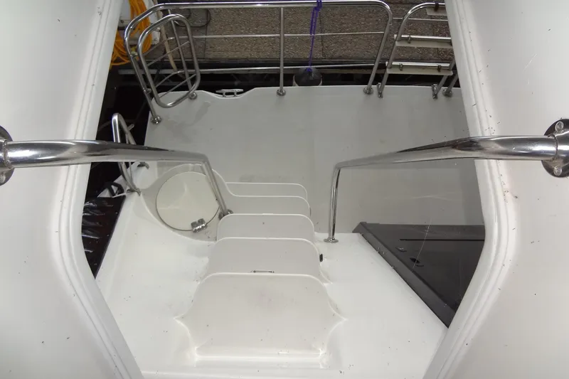 Slide: The Image of Staircase on 2008 Bluewater 5200 Signature Edition yacht with stainless steel railings. - 29