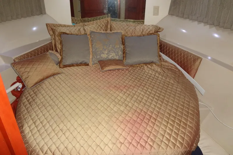 Slide: The Image of Luxurious cabin interior of 2008 Bluewater 5200 Signature Edition yacht with elegant bedding. - 37