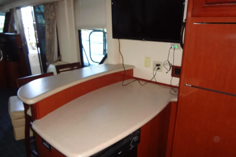 Slide: The Image of Interior of 2008 Bluewater 5200 Signature Edition yacht with modern kitchen counter. - 43