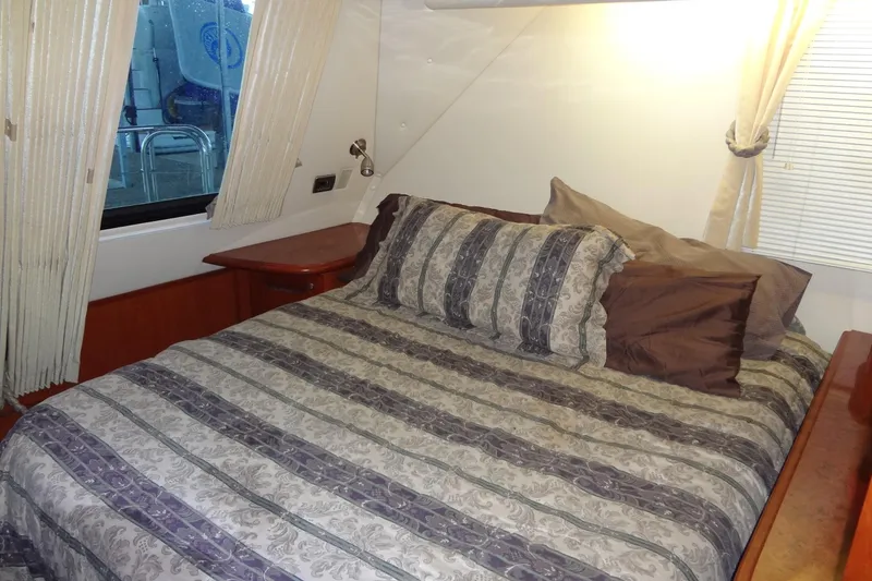 Slide: The Image of Luxurious bedroom interior of 2008 Bluewater 5200 Signature Edition yacht. - 49