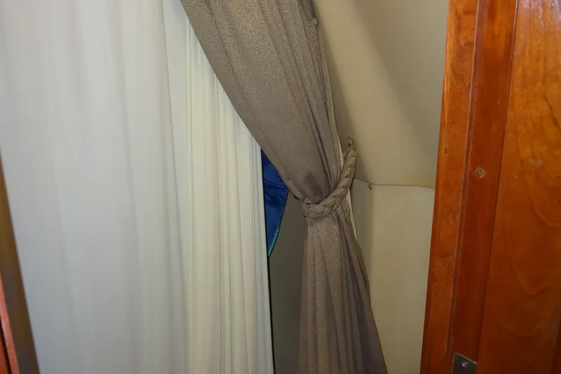 Slide: The Image of Curtained interior of 2008 Bluewater 5200 Signature Edition yacht cabin. - 53