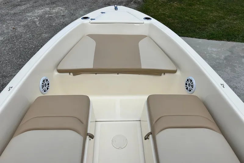 Slide: The Image of 2021 Scout 175 Dorado boat interior with beige seating and speakers. - 11