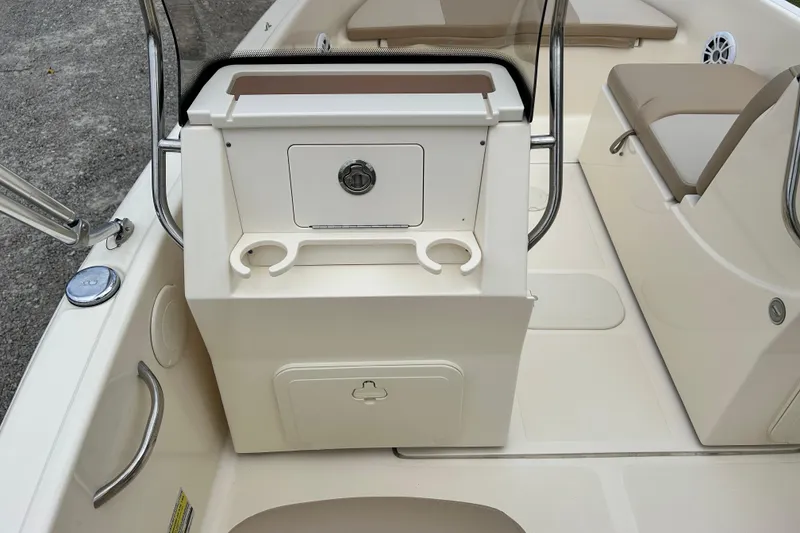 Slide: The Image of 2021 Scout 175 Dorado boat interior with seating and storage compartments. - 19