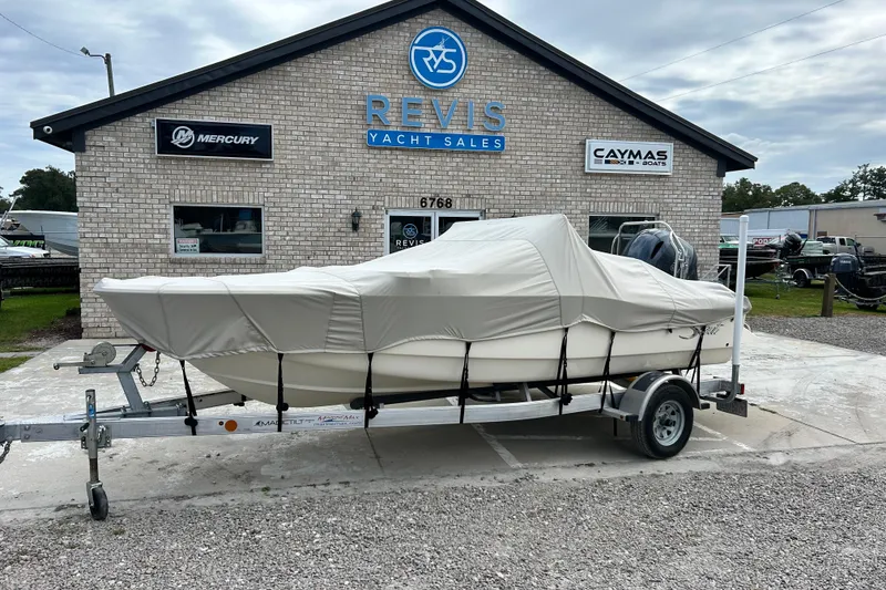 Slide: The Image of 2021 Scout 175 Dorado boat covered on trailer at Revis Yacht Sales. - 29