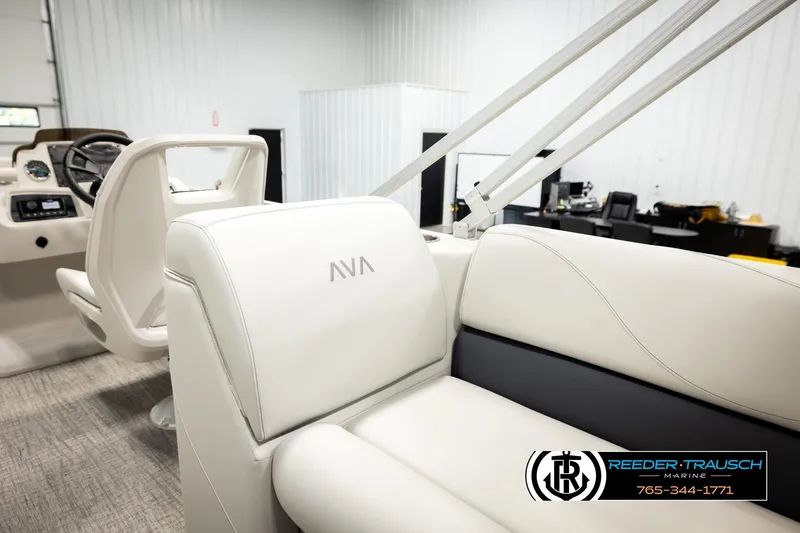 Slide: The Image of 2026 Avalon VLS QL boat interior with white seating and steering console. - 25