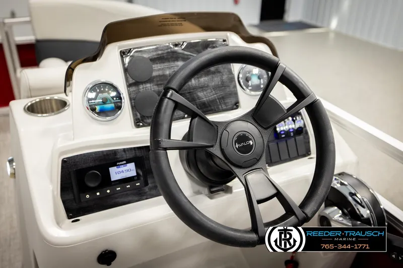 Slide: The Image of 2026 Avalon VLS QL boat dashboard with steering wheel and control panel. - 28