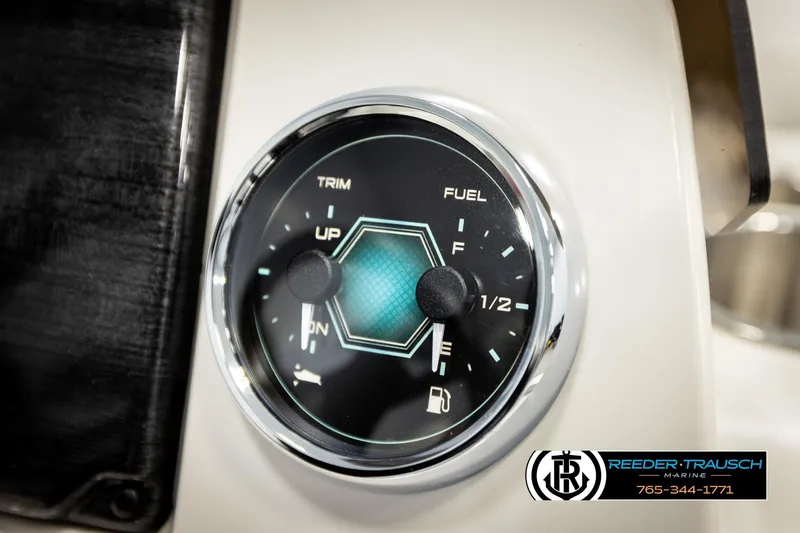 Slide: The Image of 2026 Avalon VLS QL dashboard gauge showing trim and fuel levels. - 32