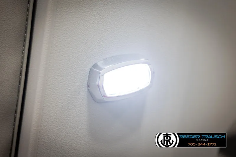 Slide: The Image of LED light on 2026 Avalon VLS QL interior, Reeder-Trausch Marine branding visible. - 40