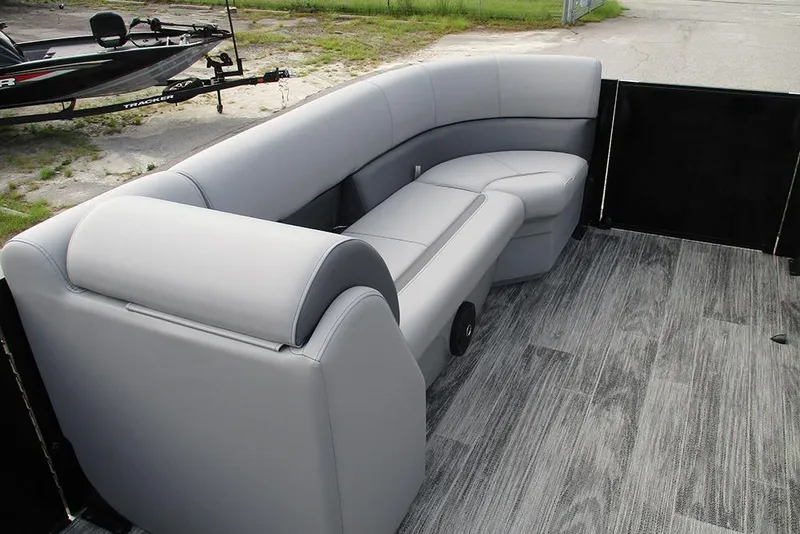 Slide: The Image of 2026 Bentley Pontoons Legacy 240 Navigator with sleek gray seating and modern flooring. - 10