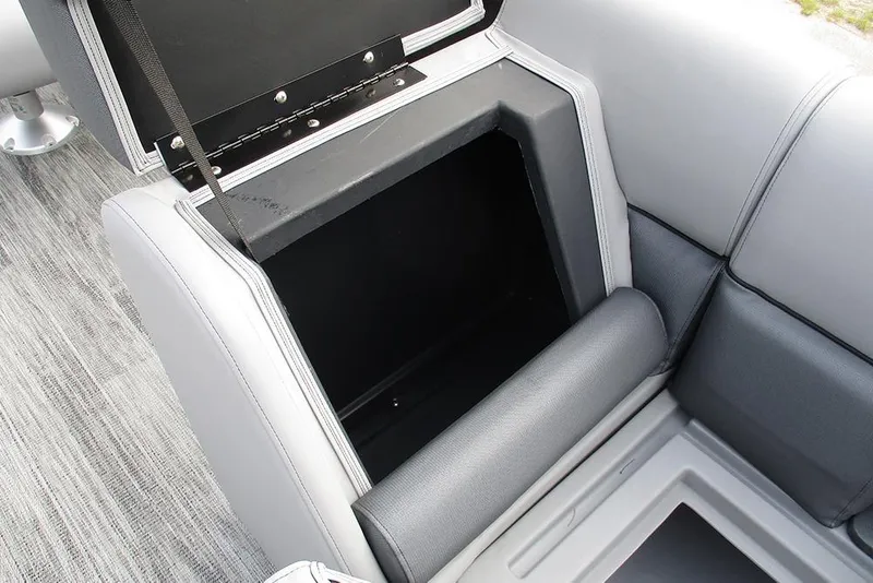 Slide: The Image of 2026 Bentley Pontoons Legacy 240 Navigator seat storage compartment, open and empty. - 14