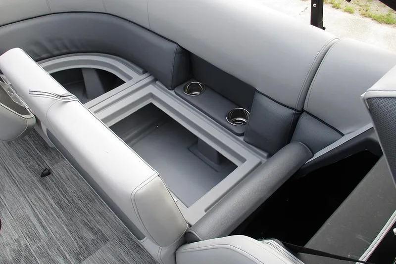 Slide: The Image of 2026 Bentley Pontoons Legacy 240 Navigator interior seating with storage and cup holders. - 20