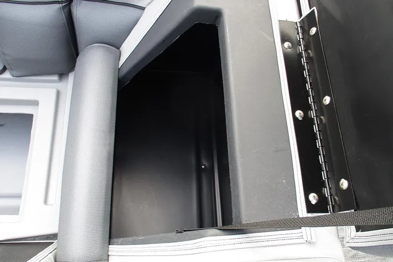 Slide: The Image of 2026 Bentley Pontoons Legacy 240 Navigator storage compartment with cushioned seating detail. - 21
