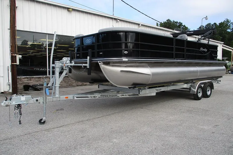 Slide: The Image of 2026 Bentley Pontoons Legacy 240 Navigator on trailer outside dealership. - 3