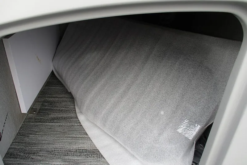 Slide: The Image of Storage compartment of 2026 Bentley Pontoons Legacy 240 Navigator, featuring protective covering. - 31