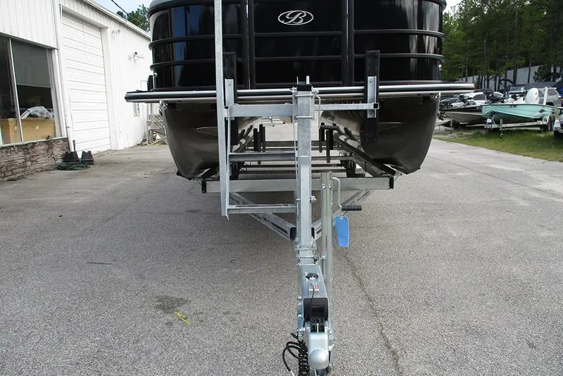 Slide: The Image of 2026 Bentley Pontoons Legacy 240 Navigator on trailer, parked outdoors. - 4