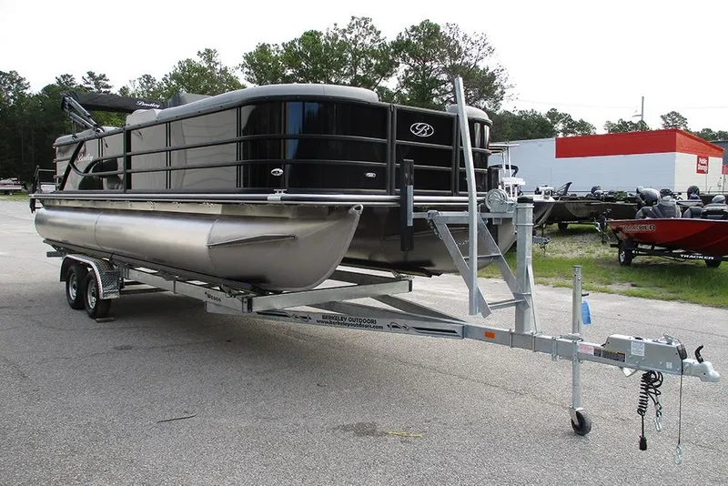 Slide: The Image of 2026 Bentley Pontoons Legacy 240 Navigator on trailer in outdoor setting. - 5