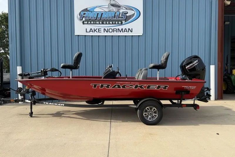 The Image of 2026 Tracker Pro Team 175 boat in red, parked at Foothills Marine Center, Lake Norman. - 2