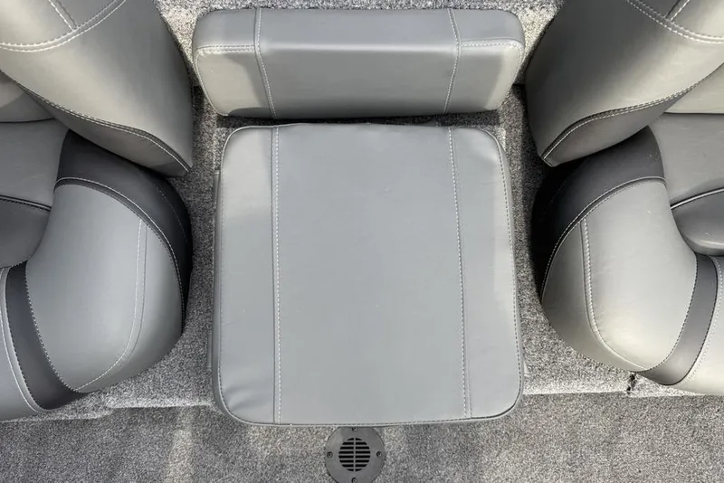 Slide: The Image of 2026 Tracker Pro Team 175 boat interior with gray cushioned seating. - 22