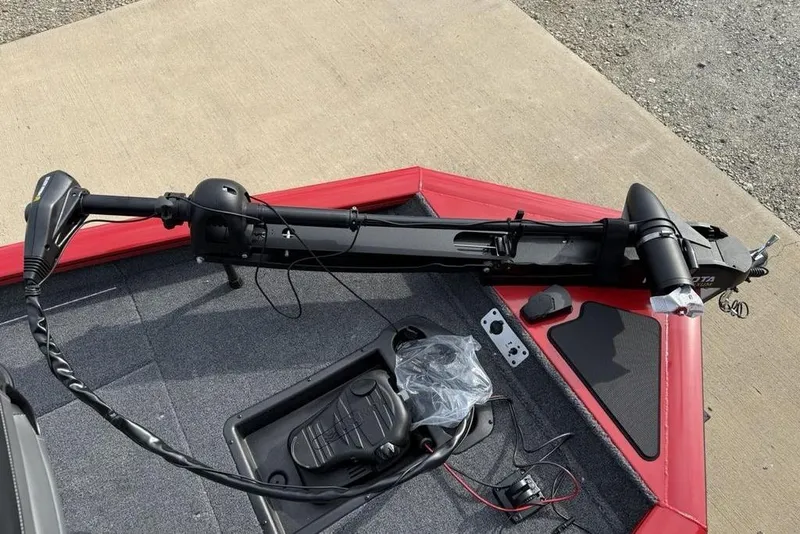 Slide: The Image of 2026 Tracker Pro Team 175 boat with trolling motor and control panel. - 5