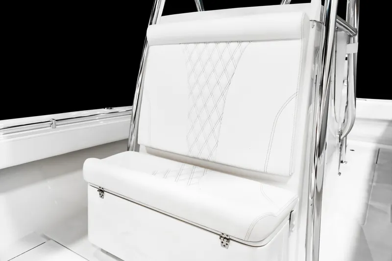 Slide: The Image of White cushioned seat on 2026 Contender 28 Tournament boat, featuring sleek design and stitching. - 11