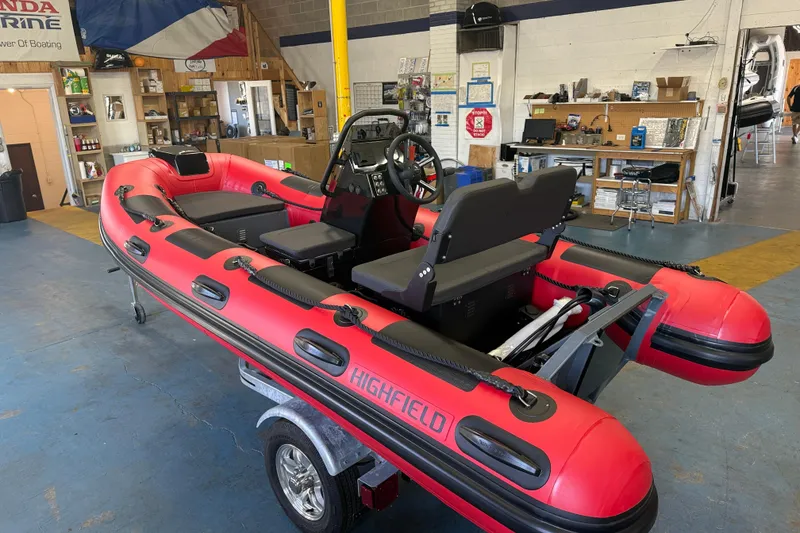 The Image of 2023 Highfield Classic 380 FCT inflatable boat in a workshop setting. - 0