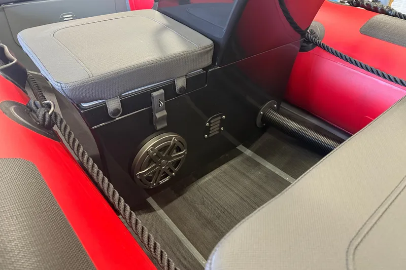 Slide: The Image of 2023 Highfield Classic 380 FCT boat interior with red and black seating. - 5