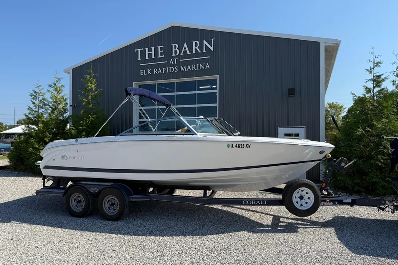 The Image of 2017 Cobalt 220S boat on trailer at Elk Rapids Marina. - 1