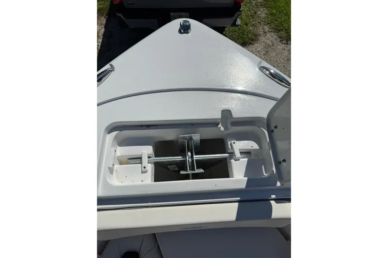 Slide: The Image of Bow anchor compartment of 2025 Sea Hunt Ultra 239 SE boat. - 17