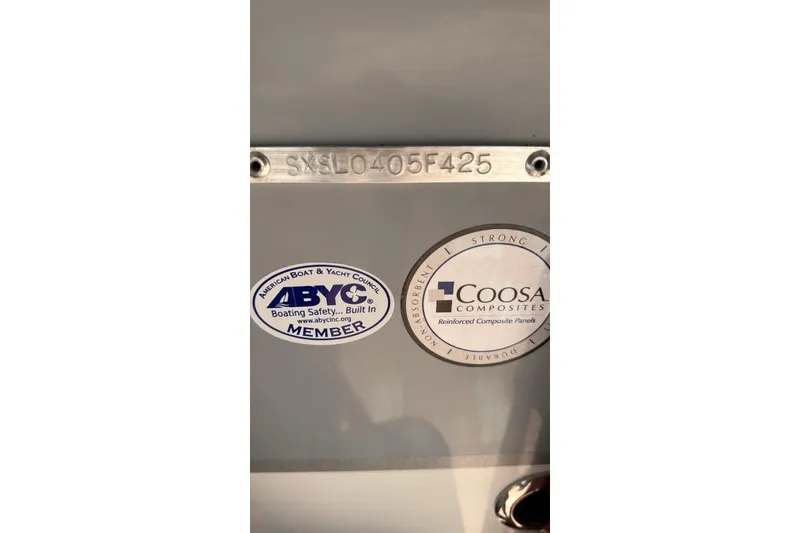 Slide: The Image of 2025 Sea Hunt Ultra 239 SE with ABYC and Coosa Composites certification labels. - 27