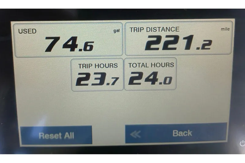 Slide: The Image of Display screen showing fuel usage, trip distance, and hours for 2025 Sea Hunt Ultra 239 SE. - 28