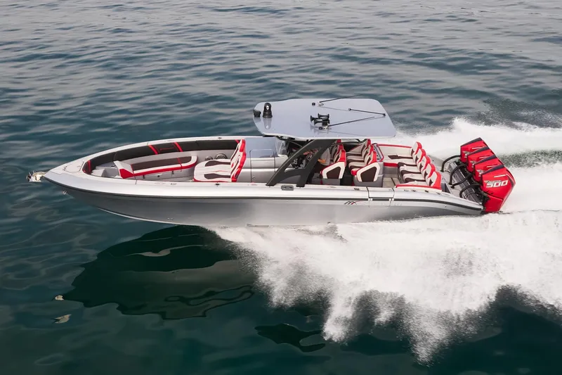 The Image of 2025 Midnight Express 37' Open boat cruising on water, featuring sleek design and powerful engines. - 0