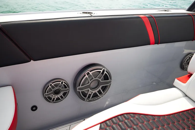 Slide: The Image of 2025 Midnight Express 37' Open boat interior with speakers and stylish seating. - 10