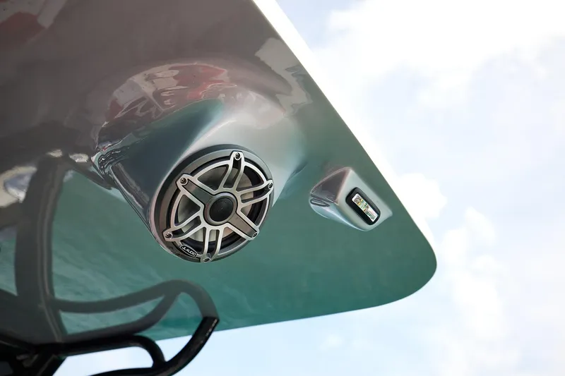 Slide: The Image of Close-up of 2025 Midnight Express 37' Open boat speaker and light against sky. - 15