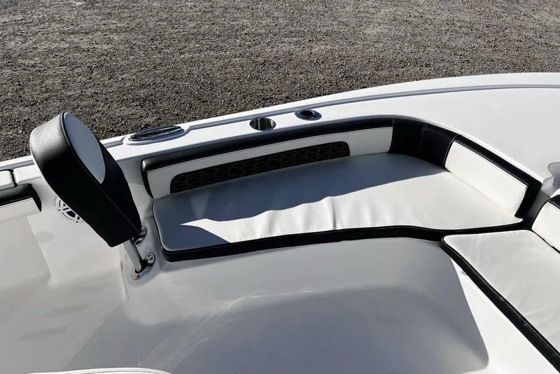 Slide: The Image of Interior seating of 2026 Tidewater 2300 Carolina Bay boat, featuring sleek white and black design. - 20