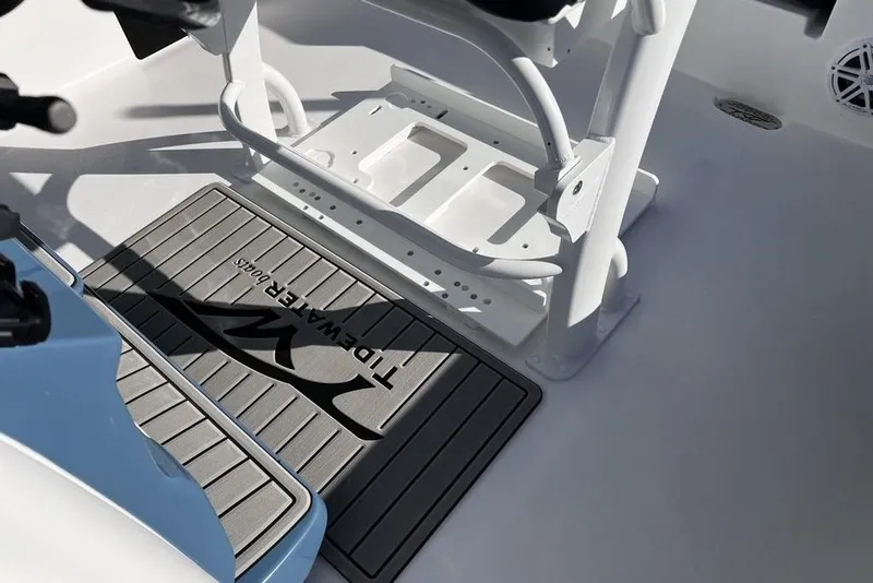 Slide: The Image of 2026 Tidewater 2300 Carolina Bay boat interior with branded mat and seating. - 35