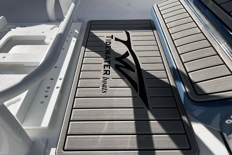 Slide: The Image of Deck of 2026 Tidewater 2300 Carolina Bay boat with branded mat. - 44