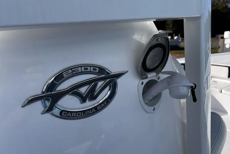 Slide: The Image of 2026 Tidewater 2300 Carolina Bay boat emblem and fuel cap detail. - 45
