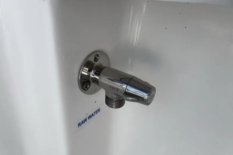 Slide: The Image of Chrome raw water outlet on 2026 Tidewater 2300 Carolina Bay boat. - 46