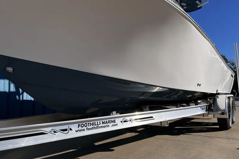 Slide: The Image of 2026 Tidewater 2300 Carolina Bay boat on trailer at Foothills Marine dealership. - 6
