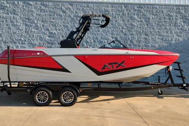 The Image of 2026 ATX Surf Boats 22 Type-S in red and white on a trailer. - 1