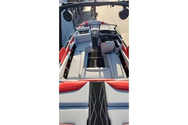 Slide: The Image of 2026 ATX Surf Boats 22 Type-S interior with red and gray seating, sleek design. - 11
