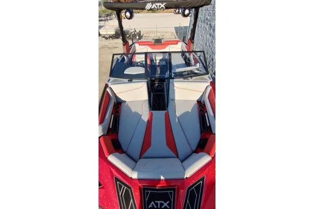 Slide: The Image of 2026 ATX Surf Boats 22 Type-S with red and gray seating, viewed from above. - 4
