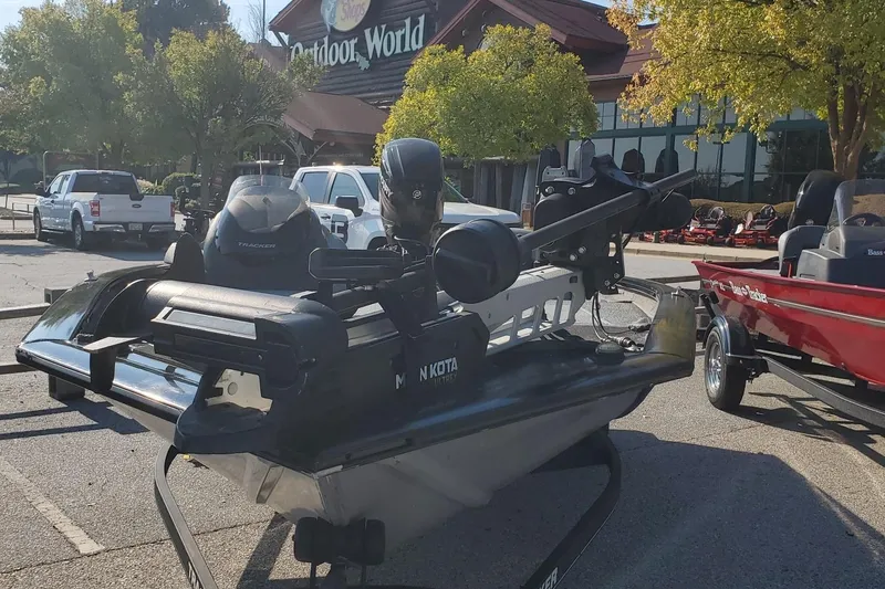 Slide: The Image of 2018 Tracker Pro Team 195 TXW boat at Outdoor World parking lot. - 2