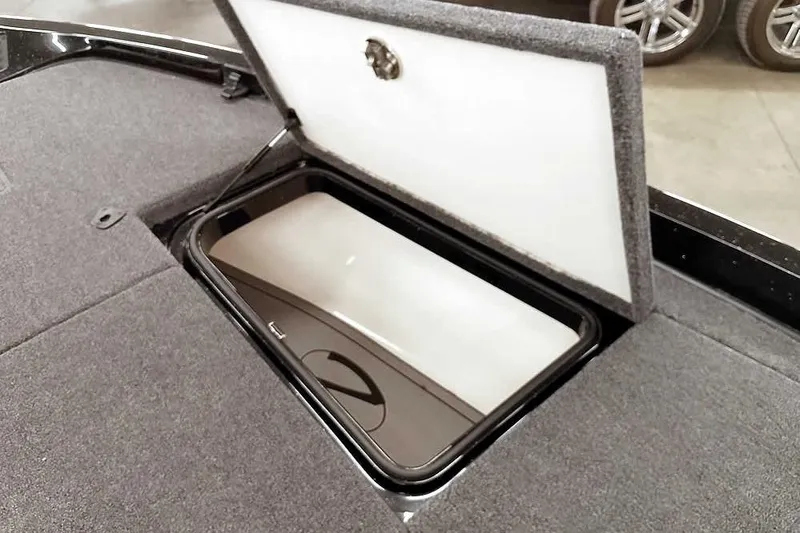 Slide: The Image of 2025 Ranger Z518 Ranger Cup Equipped boat storage compartment open. - 15