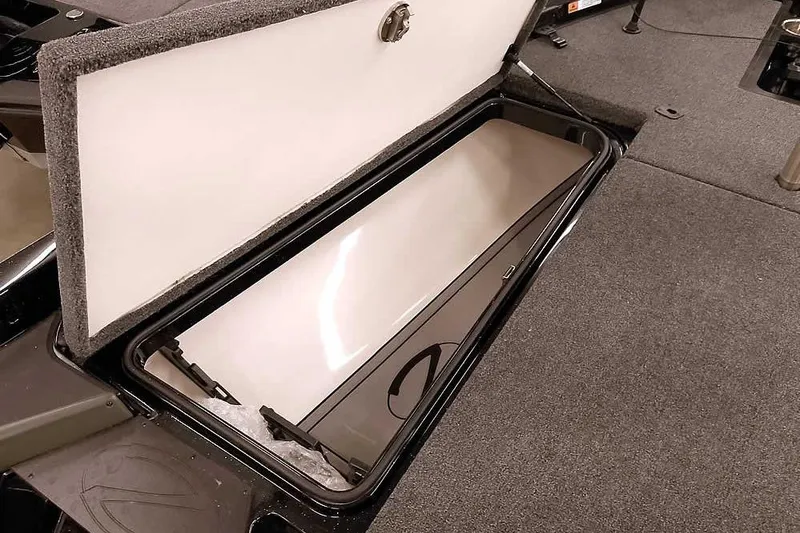 Slide: The Image of 2025 Ranger Z518 Ranger Cup Equipped boat storage compartment open, showcasing interior space. - 16