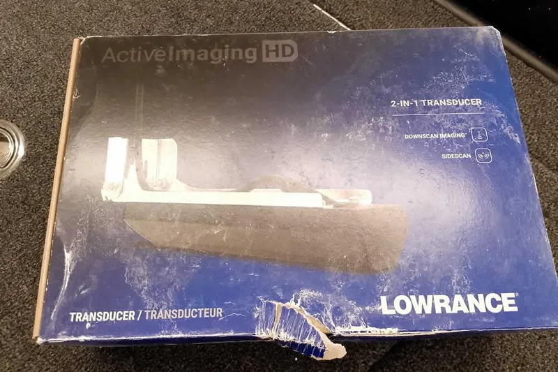 Slide: The Image of Box of Lowrance Active Imaging HD 2-in-1 Transducer on Ranger Z518 boat. - 20
