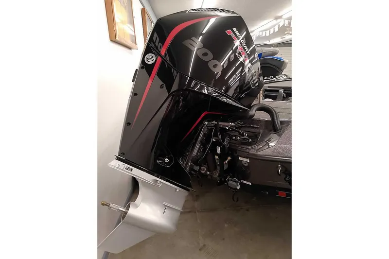 Slide: The Image of 2025 Ranger Z518 Ranger Cup Equipped boat with powerful outboard motor in garage. - 3